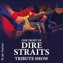 Gitarrist spielt E-Gitarre bei Tribute-Show.